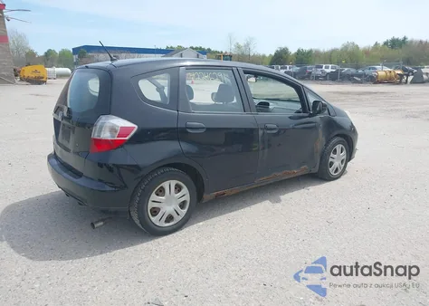 2009 Honda Fit from USA, damaged, VIN JHMGE872X9S061071